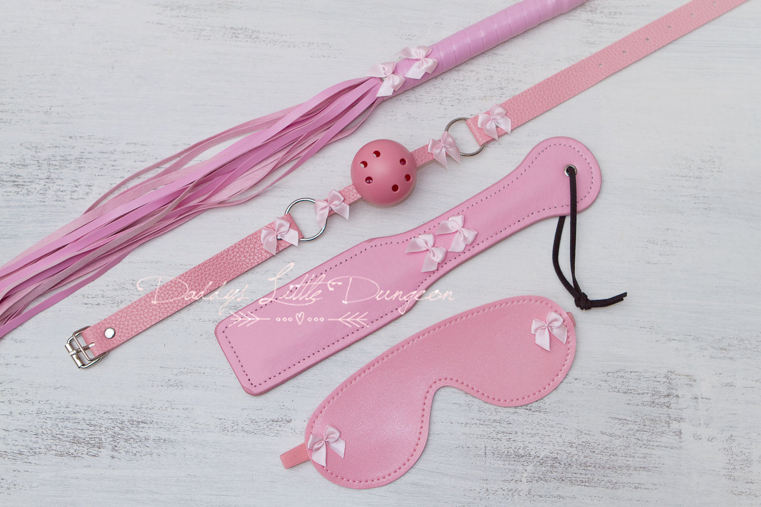 Kinky fetish bondage ball gags, whips, floggers, paddles, eye masks and blindfolds, and other gear and accessories for light bondage and BDSM sessions, femdom, DDLG, MDLB, DDLB, MDLG &amp; ABDL roleplay, cosplay, pet play or petplay.